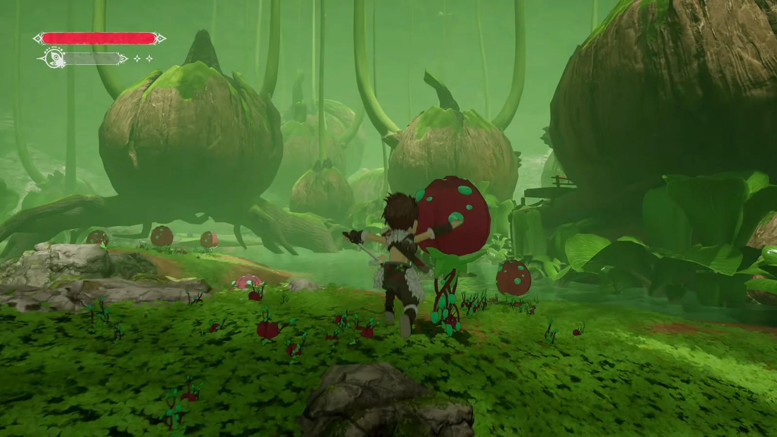 Player character standing in a green forest with giant seed-pod plants and a red spotted bulb, with a health bar in the top-left corner, in the Winds of Viridia reveal trailer